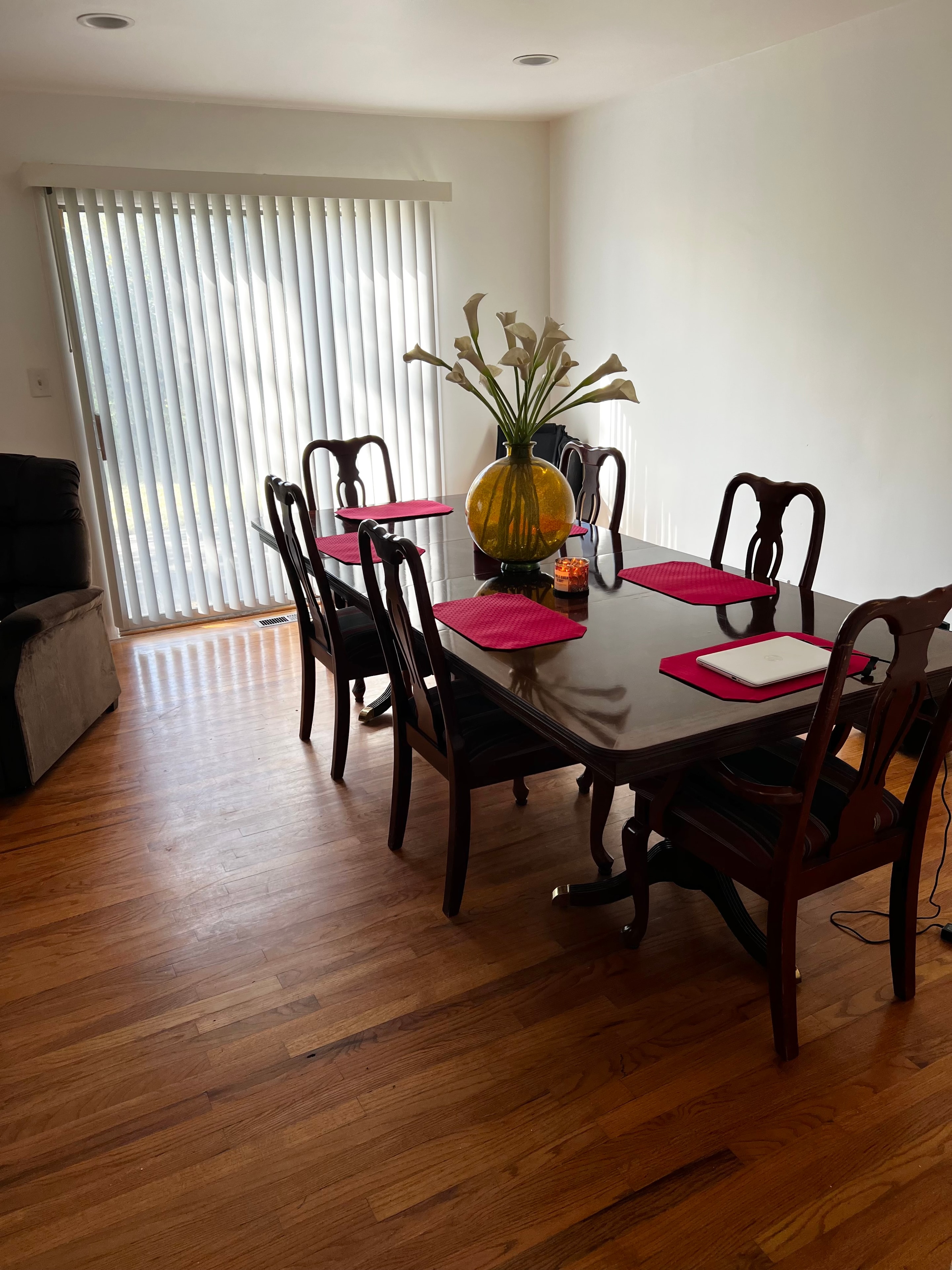 Dining room with elegant table and warm wood floors