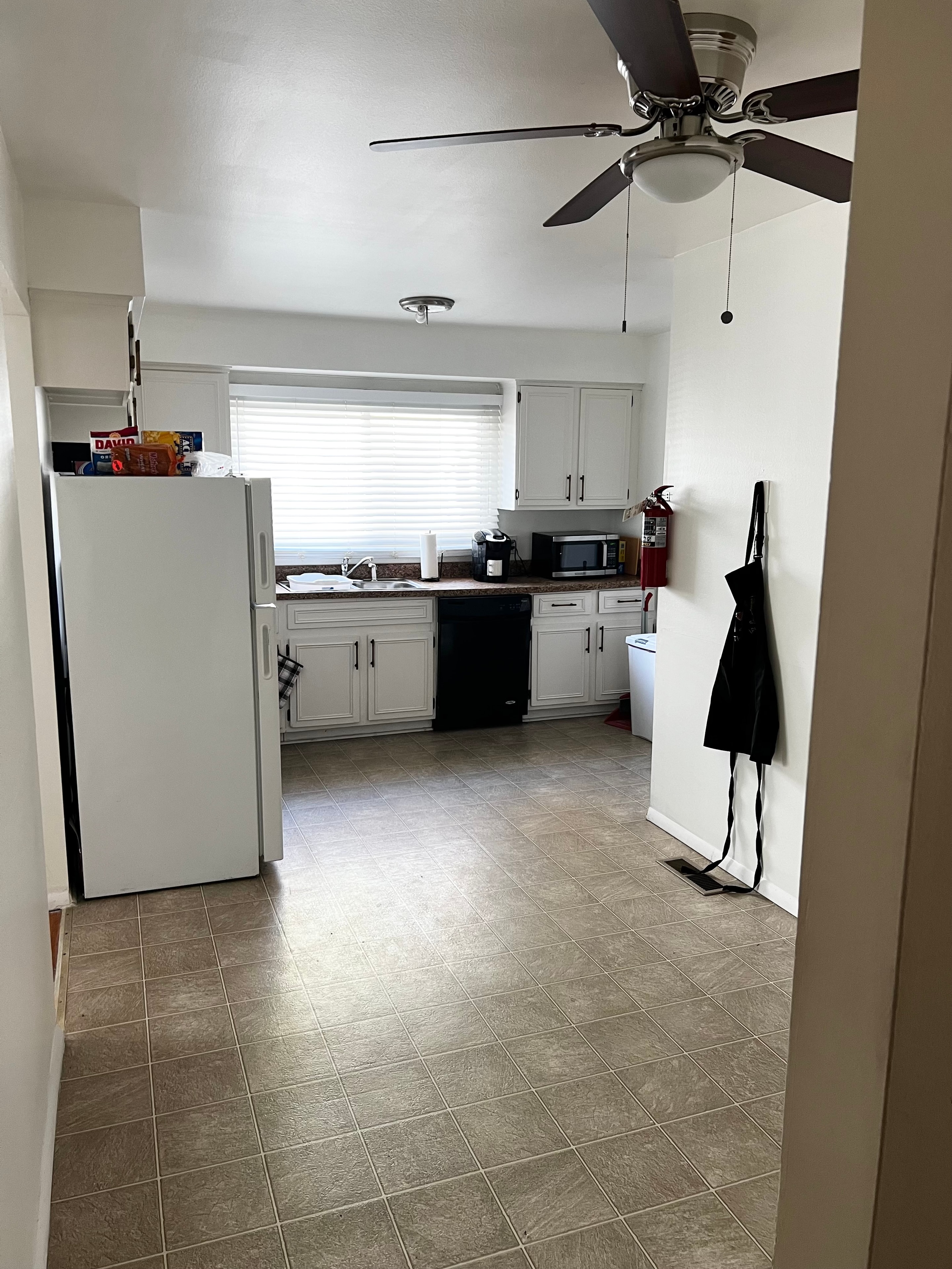 Full kitchen with appliances and bright natural light